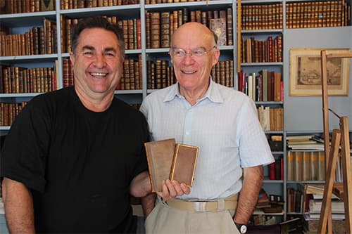 My husband Peter, with my new friend, the Parisian Antiquarian Book Seller.